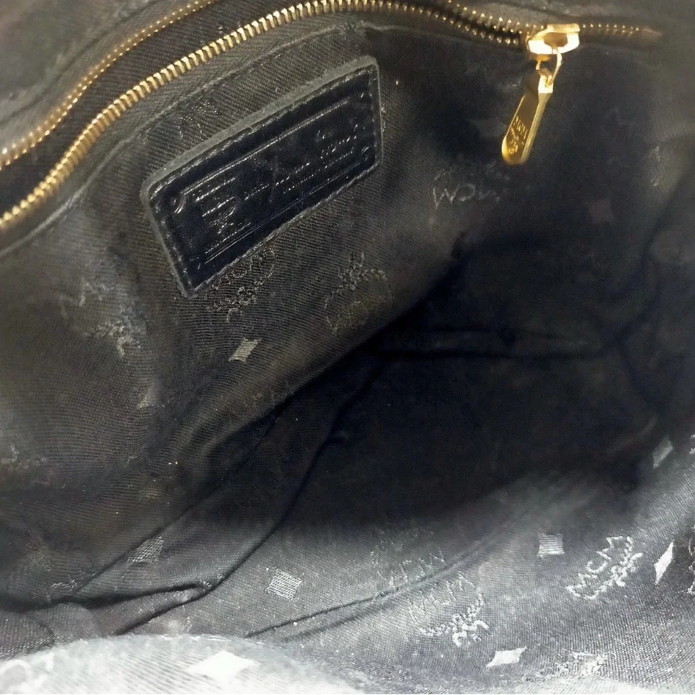 MCM Black Satchel with Gold Accents lock and key included authentic